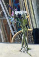 Flowers against background of paintings